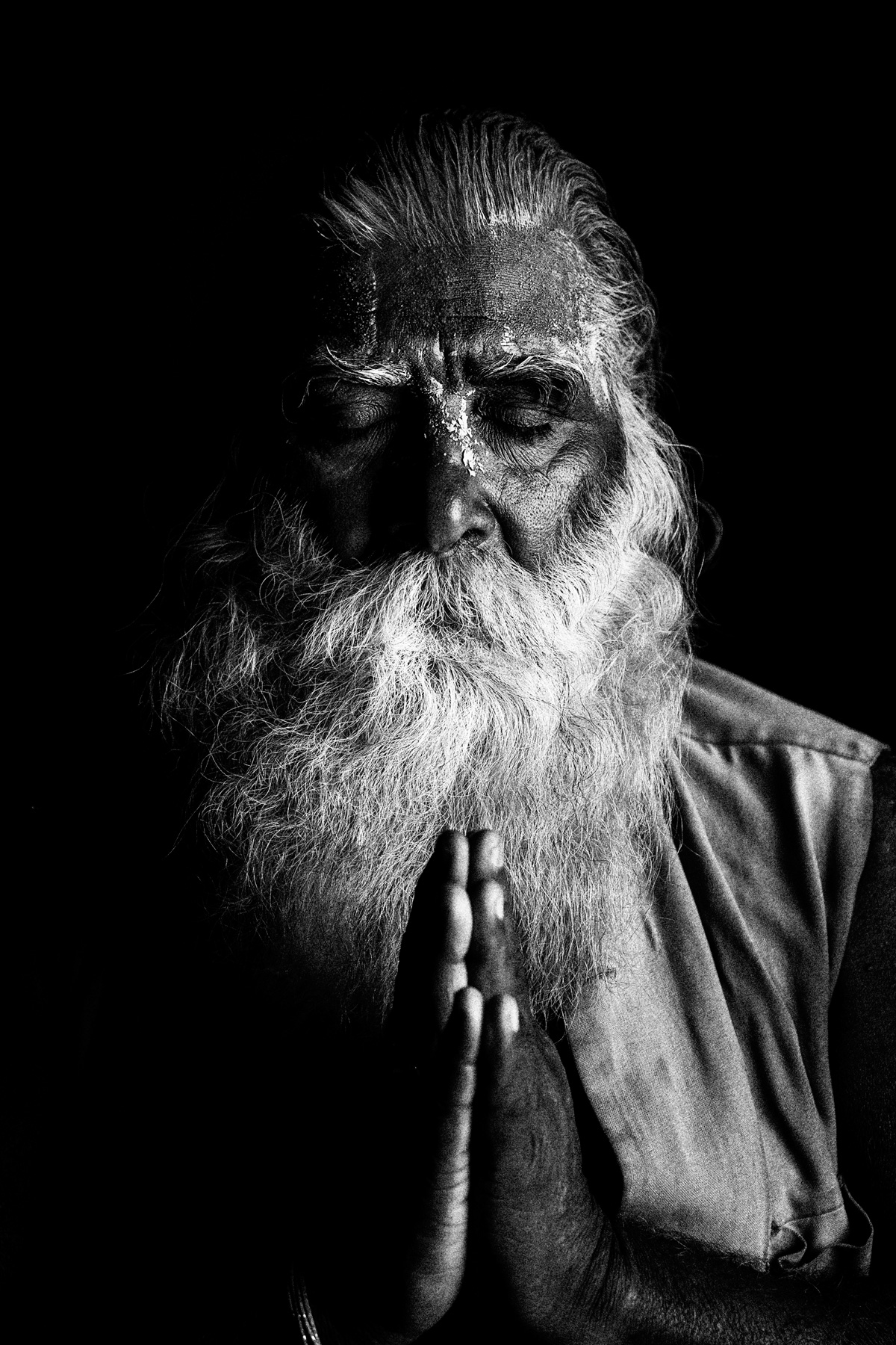Eyes Closed Portrait of a Nepalese Sadhu: Black and White Portrait Photography by Jean Tran and Élysée Lang